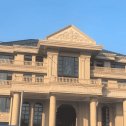 商洛黄金麻别墅外墙干挂石材效果示例