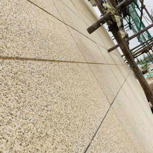 商洛 黄金麻花岗岩荔枝面外墙干挂石材效果示例