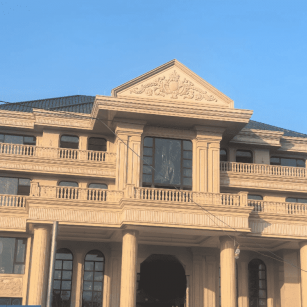 商洛黄金麻别墅外墙干挂石材效果示例